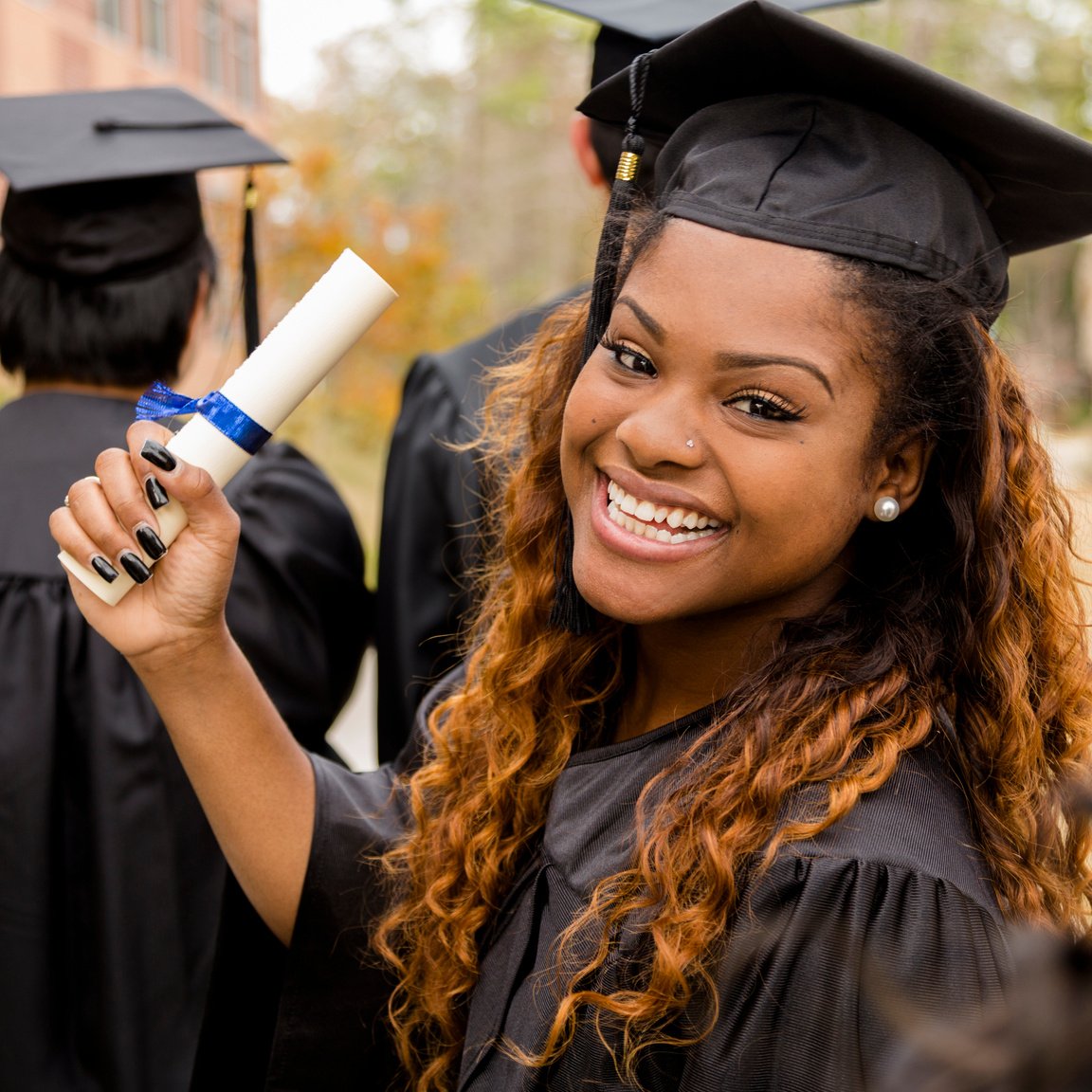 African descent college student at college graduation.